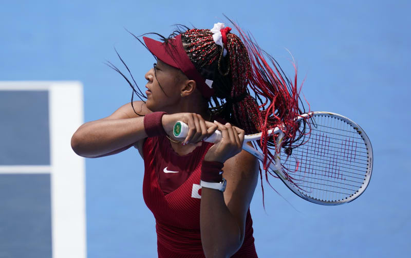 Domácí tenisová hvězda Naomi Ósakaová v turnaji dlouho nevydržela, když ji vyřadila Markéta Vondroušová. Ale její vlasy zanechaly pořádnou stopu.