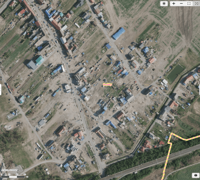 Letecký snímek obce Hrušky z 24. července