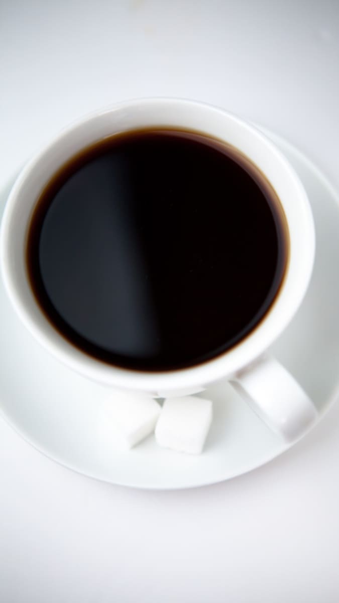 Kafe a test černá s cukrem