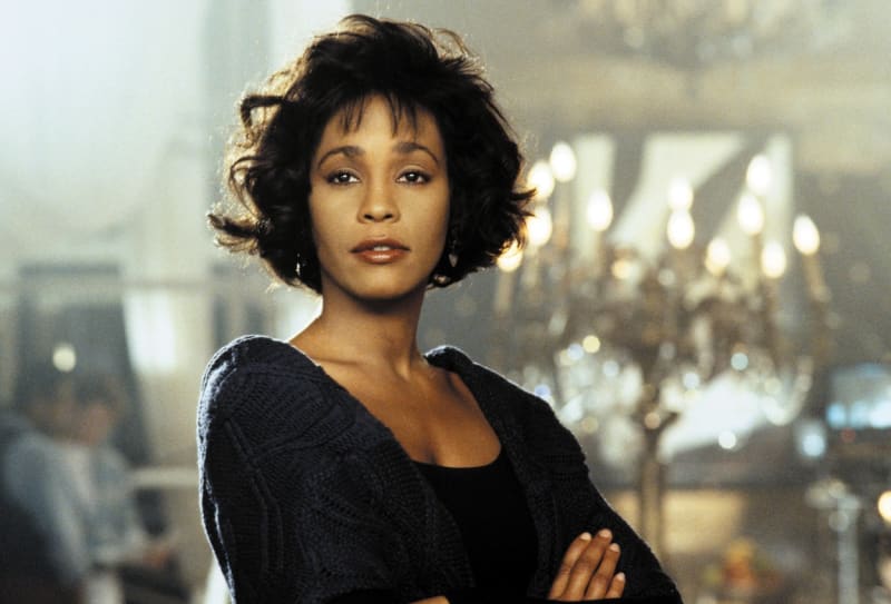 Whitney Houston v úspěšném snímku Bodyguard, kde si zahrála Kevinem Costnerem