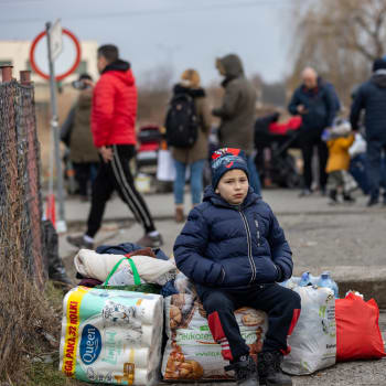 Ukrajinci prchající přes polské hranice