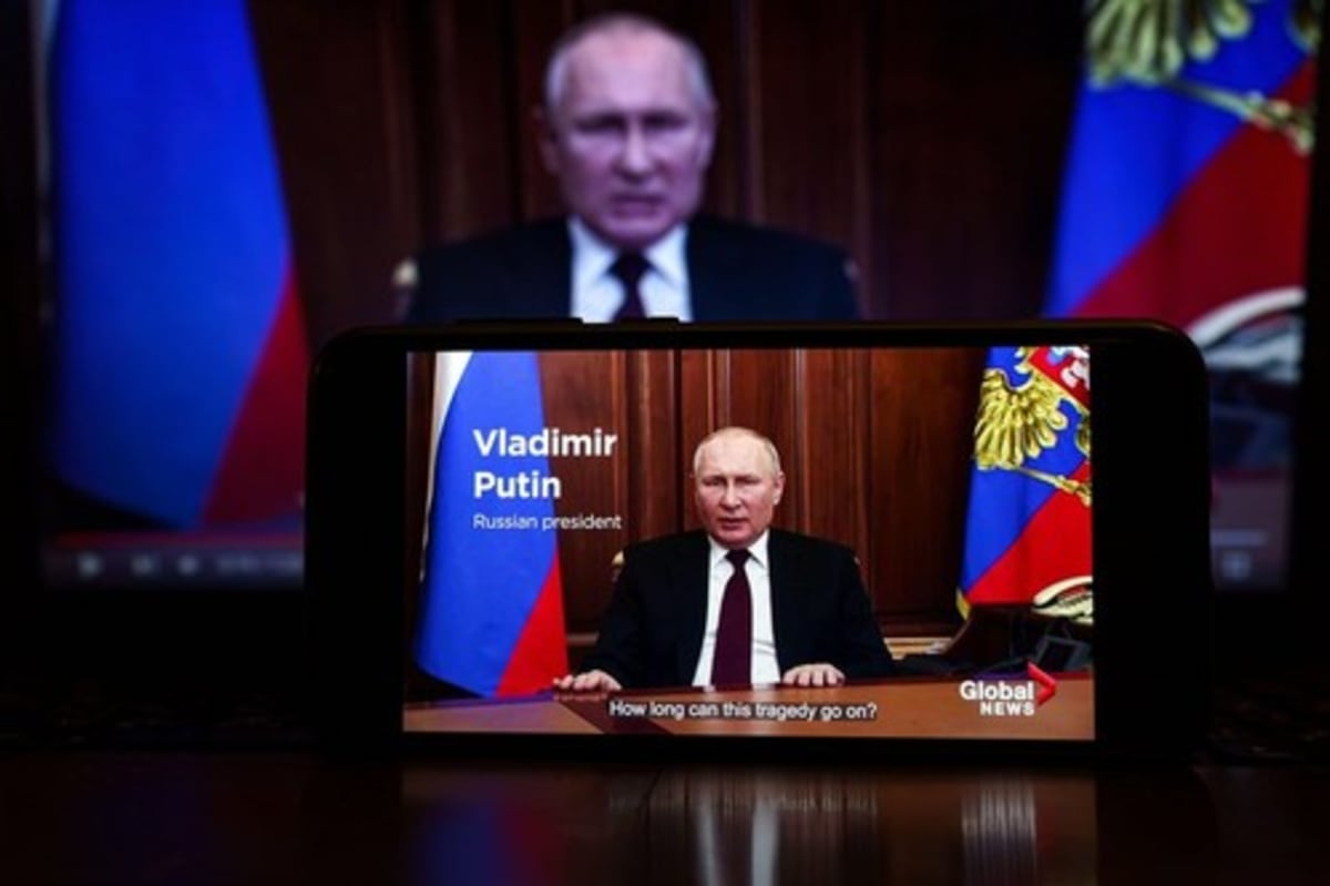 Ruský prezident Vladimir Putin při projevu v ruské televizi, když oznámil invazi na Ukrajinu.