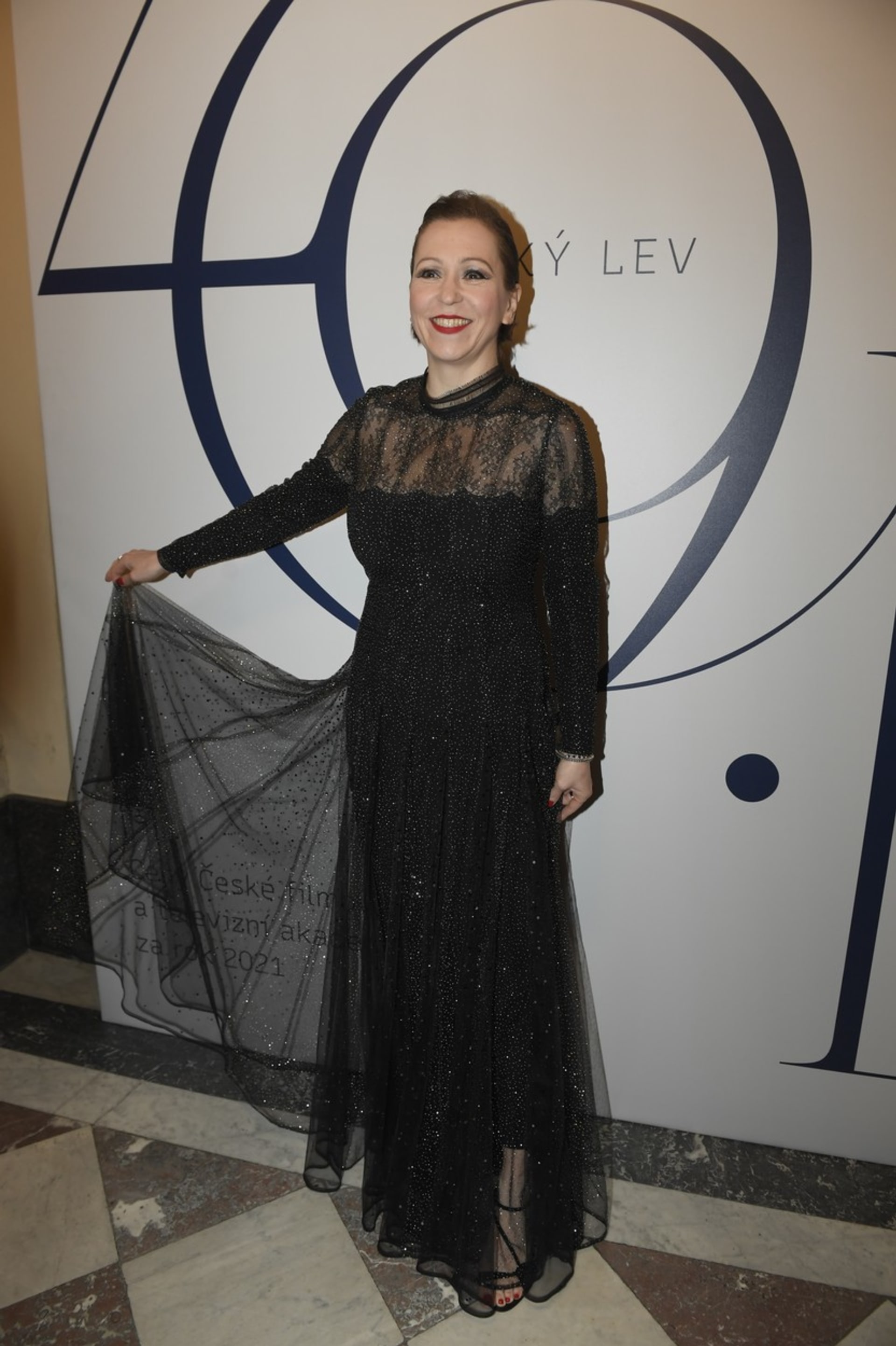 Galavečera se zúčastnila i herečka Zuzana Stivínová v černé róbě.