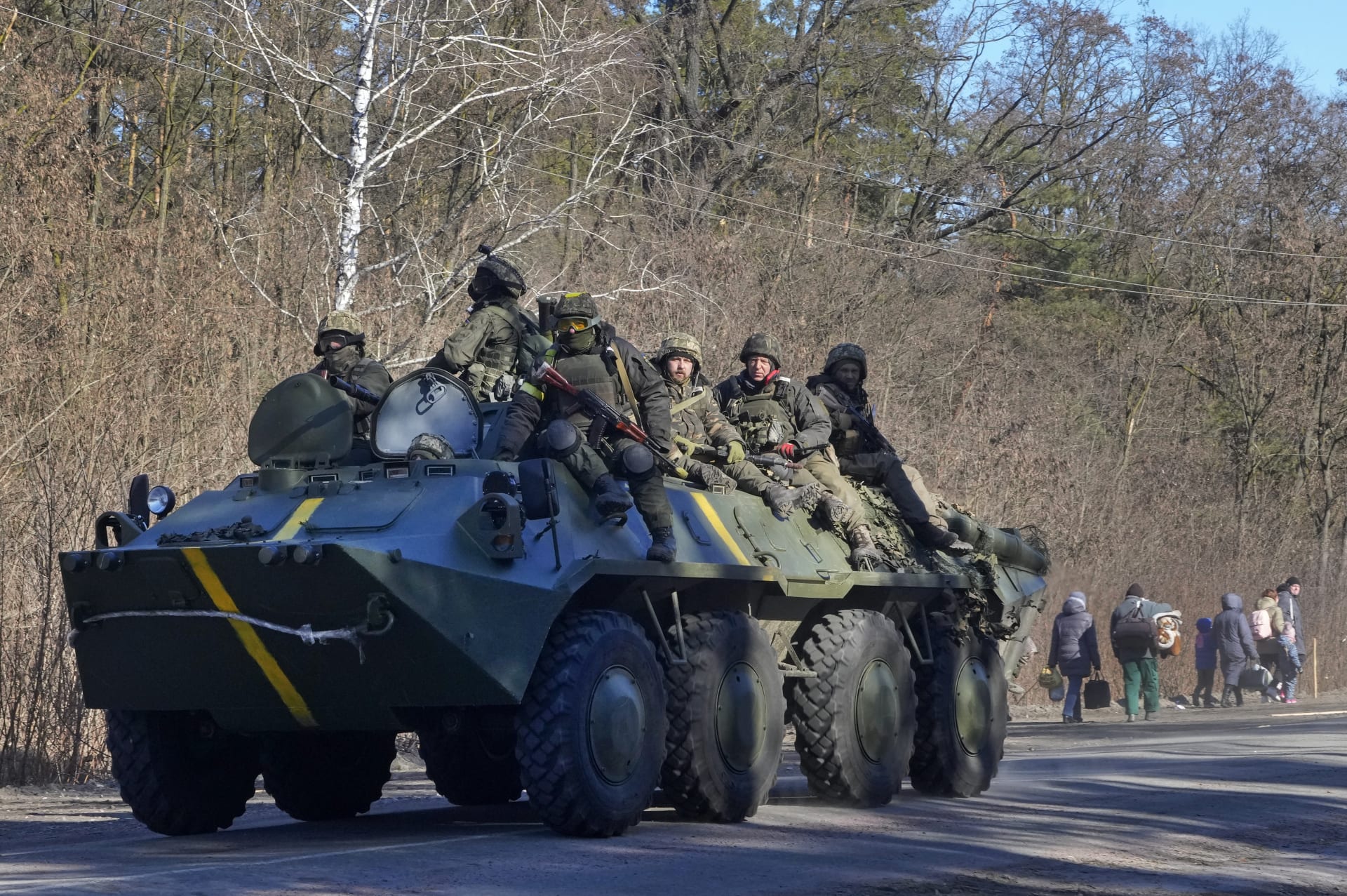 Ukrajinští vojáci na obrněném transportéru, 10. března