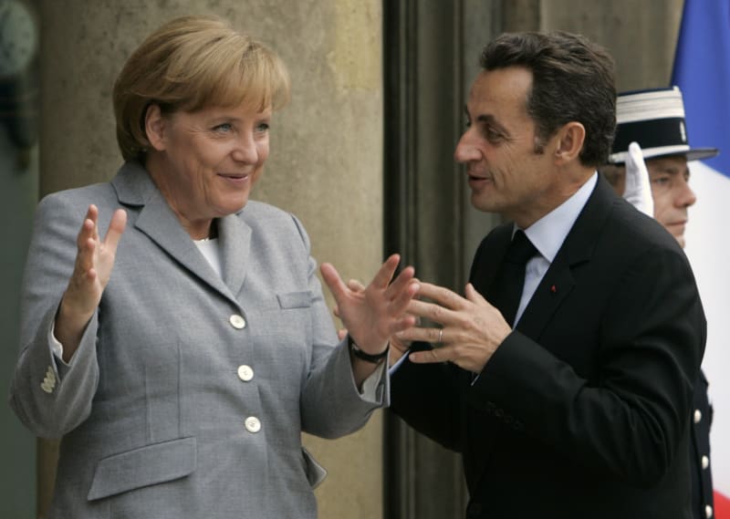 Merkelová a Sarkozy