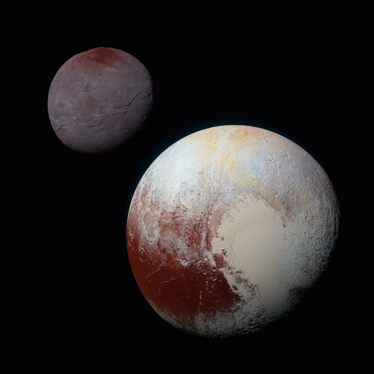 Pluto a jeho měsíc Charon