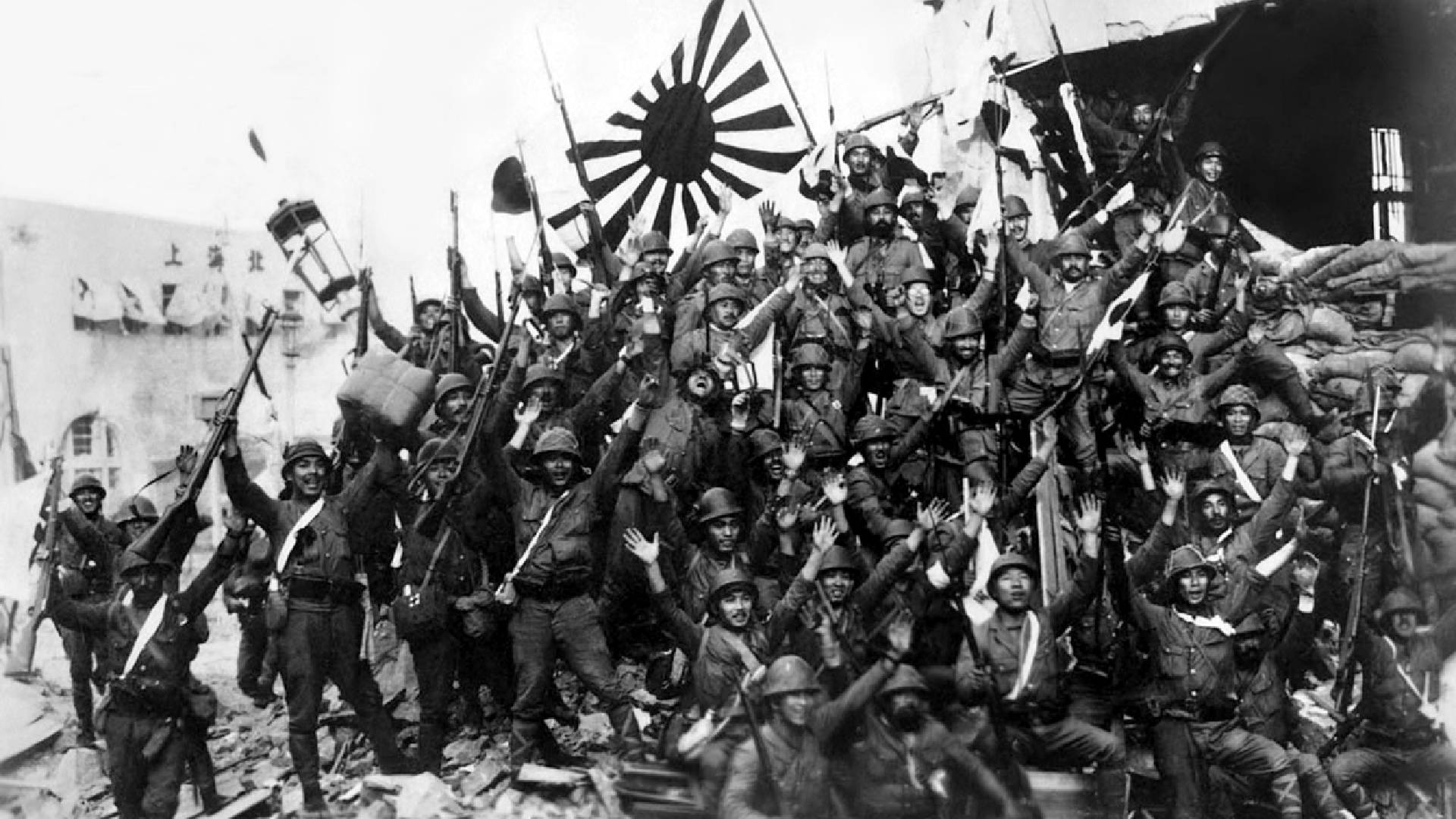 Japonští vojáci oslavují dobytí Šanghaje v prosinci 1937