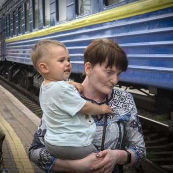 Uprchlíci z Ukrajiny u vlaku.