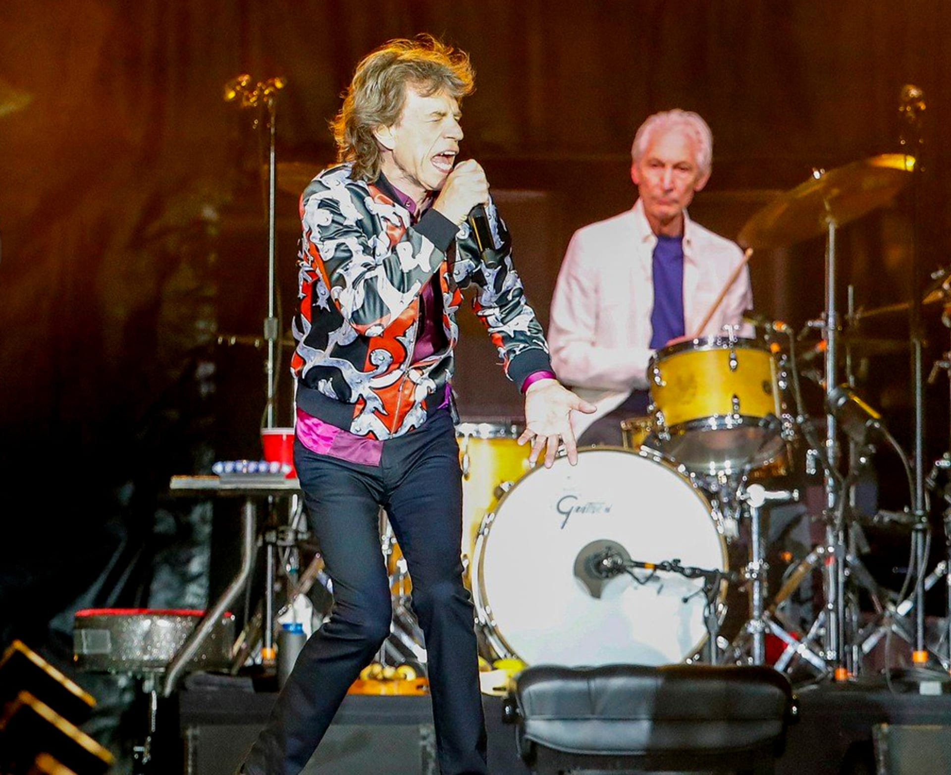 Pátý je zpěvák The Rolling Stones Mick Jagger (v popředí) s majetkem čítajícím 360 milionů dolarů.