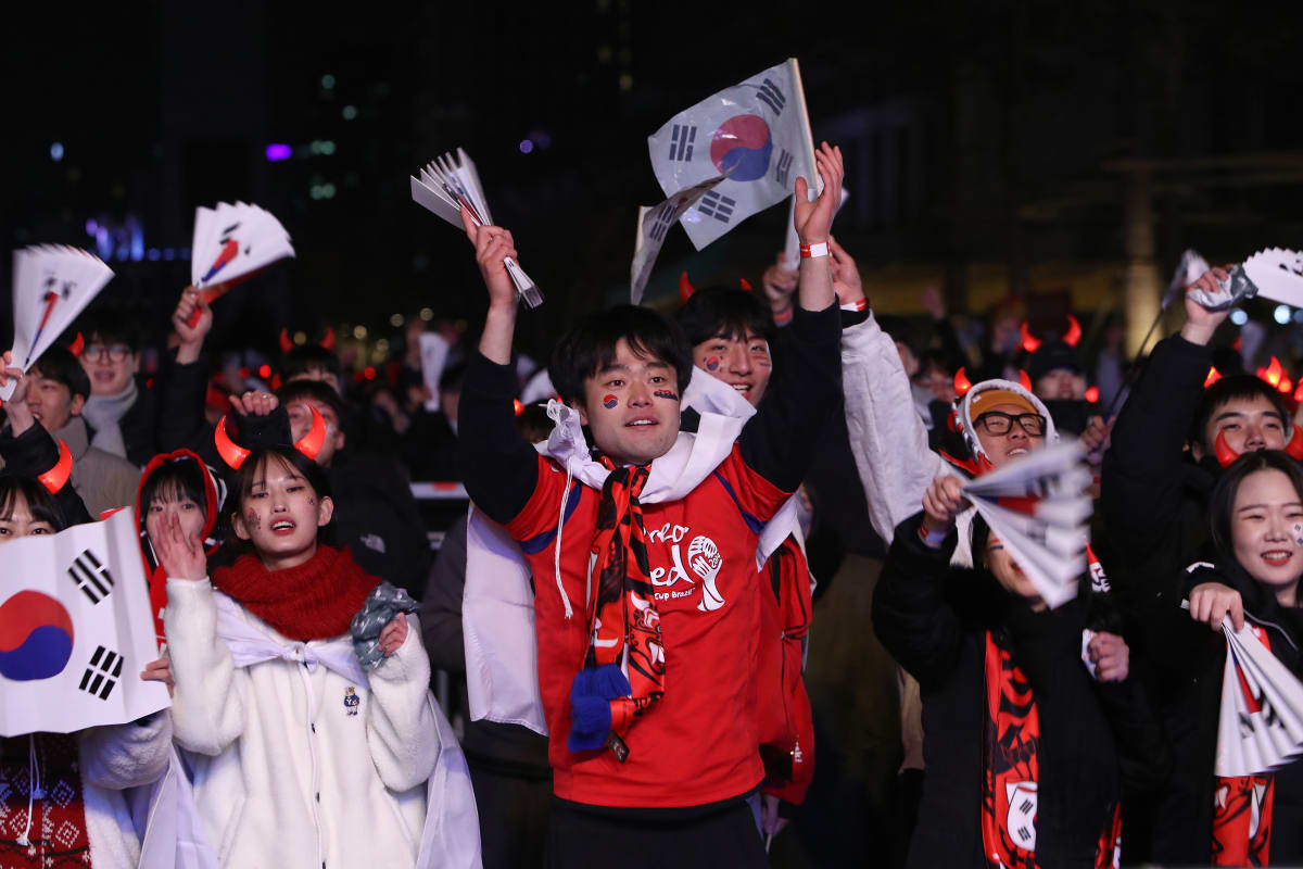Jihokorejští fanoušci v Soulu během utkání s Brazílií
