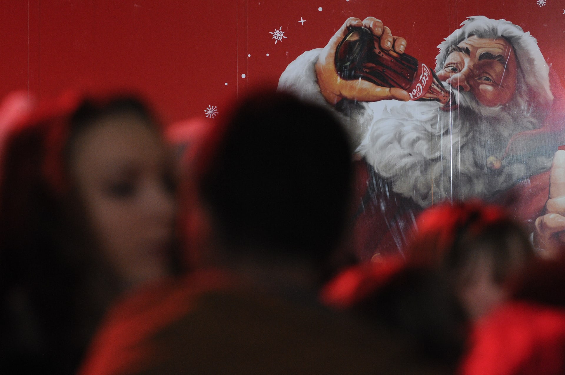 Santa na korbě Coca Coly