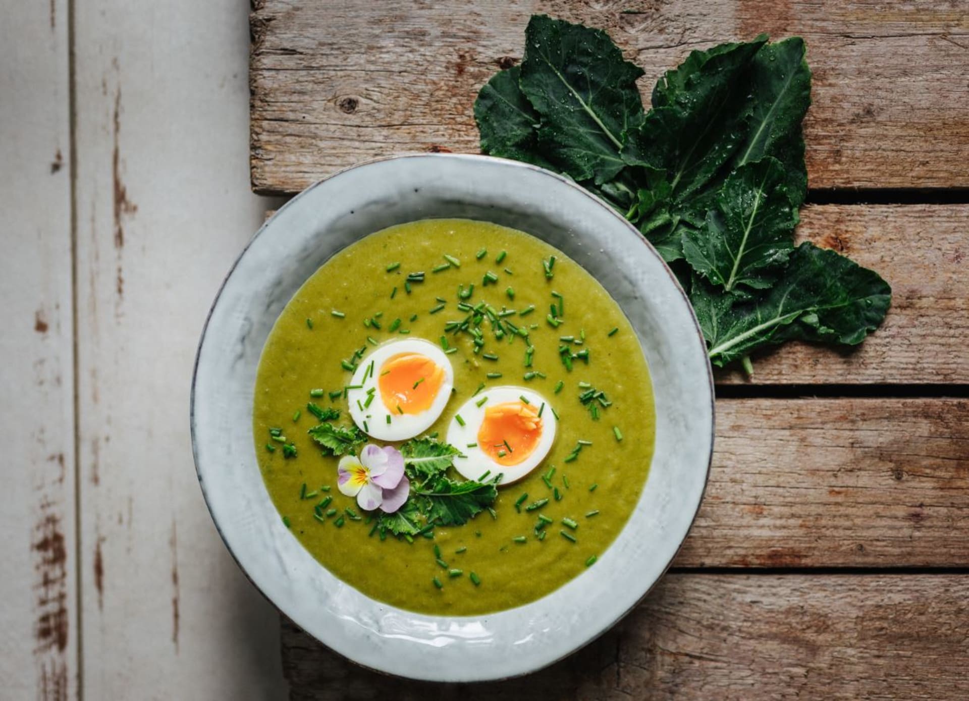 Creamy soup made from whole cabbage with an egg