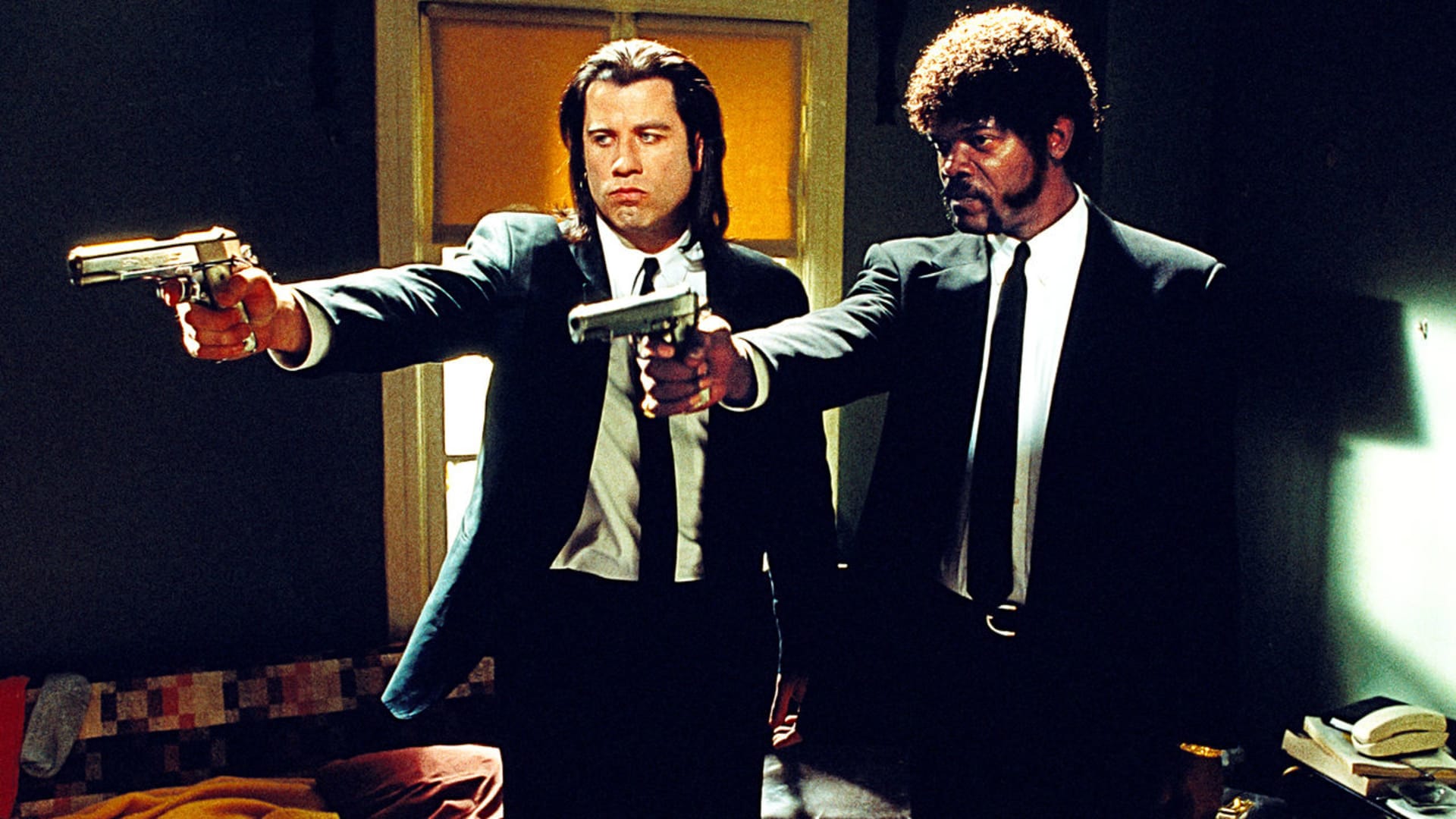 John Travolta a Samuel L. Jackson ve filmu Pulp Fiction