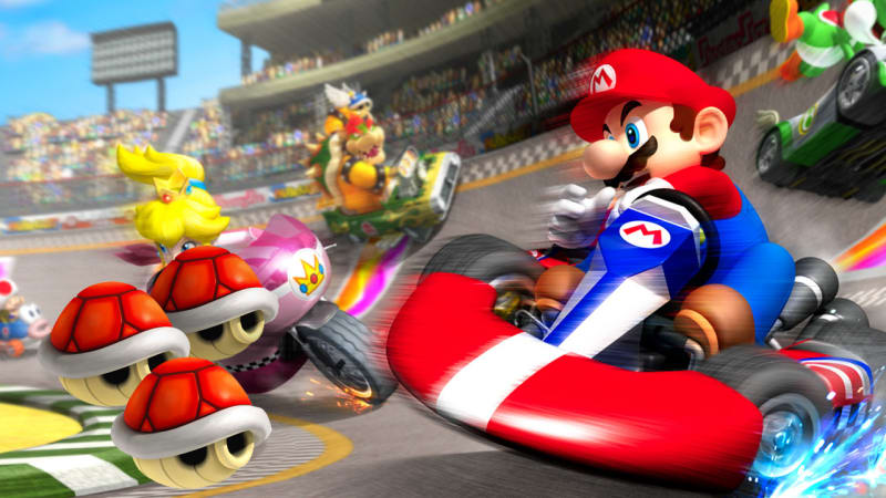 Mario Kart | Závodní hry jsou obvykle výsadou osamělých jezdců, kteří to myslí vážně. Nintendo ale předhazuje své skvělé Mario Karts - zlomyslnou zábavu pro celou rodinu