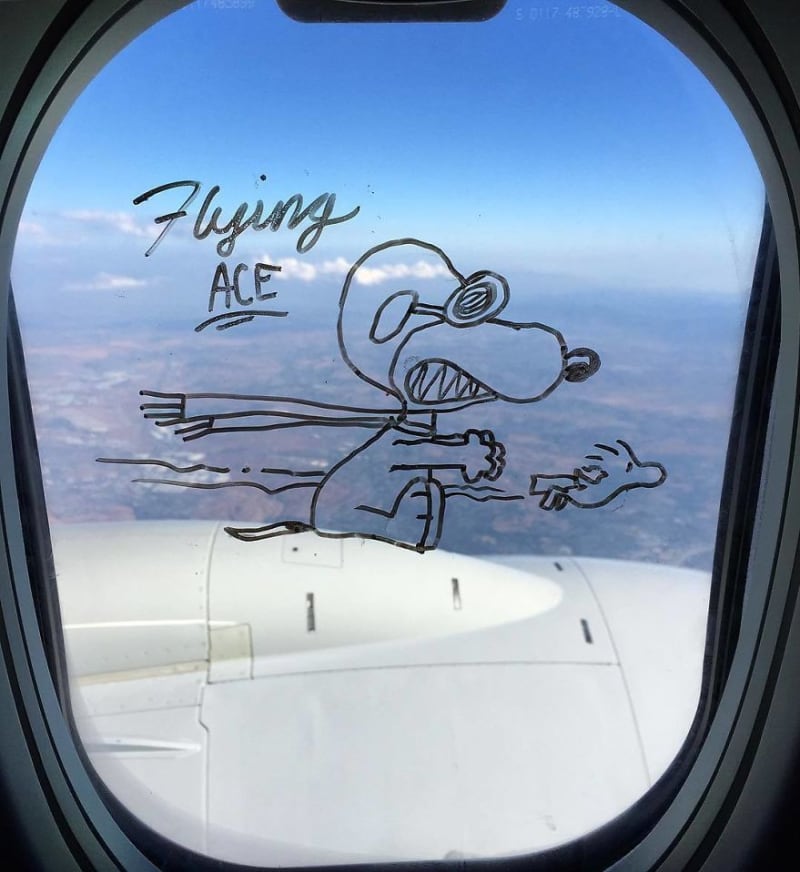 Vtipné kresby na okénku letadla 1