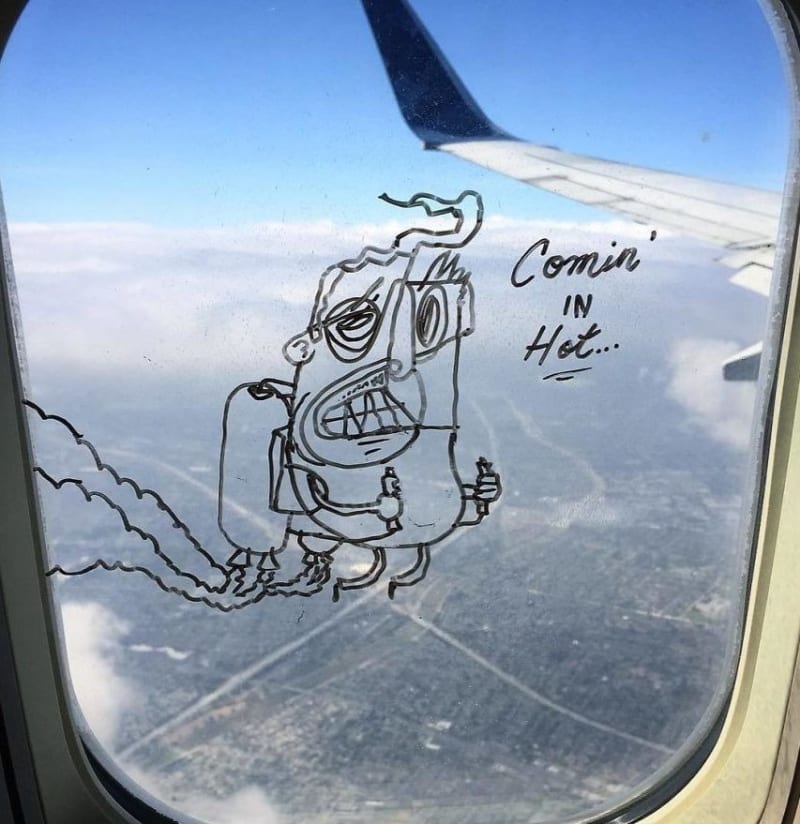 Vtipné kresby na okénku letadla 9