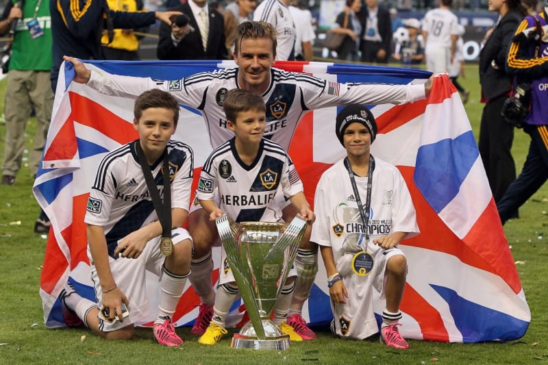 Zasloužilý otec David Beckham a jeho synové Romeo, Brooklyn a Cruz