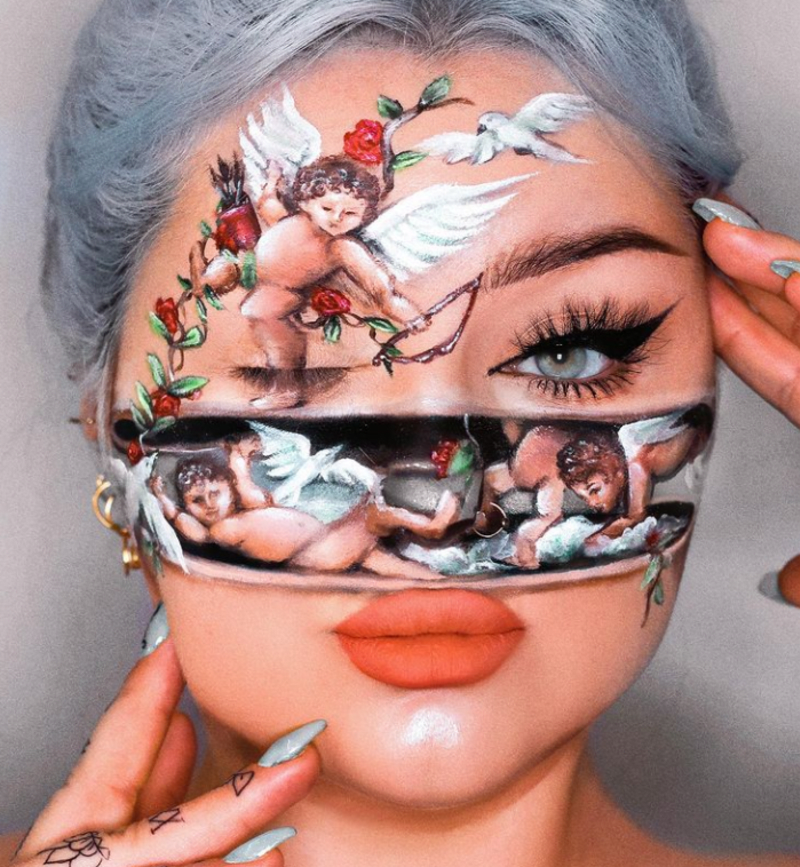 Umělkyně maluje bombastické obrazy na svůj obličej 6