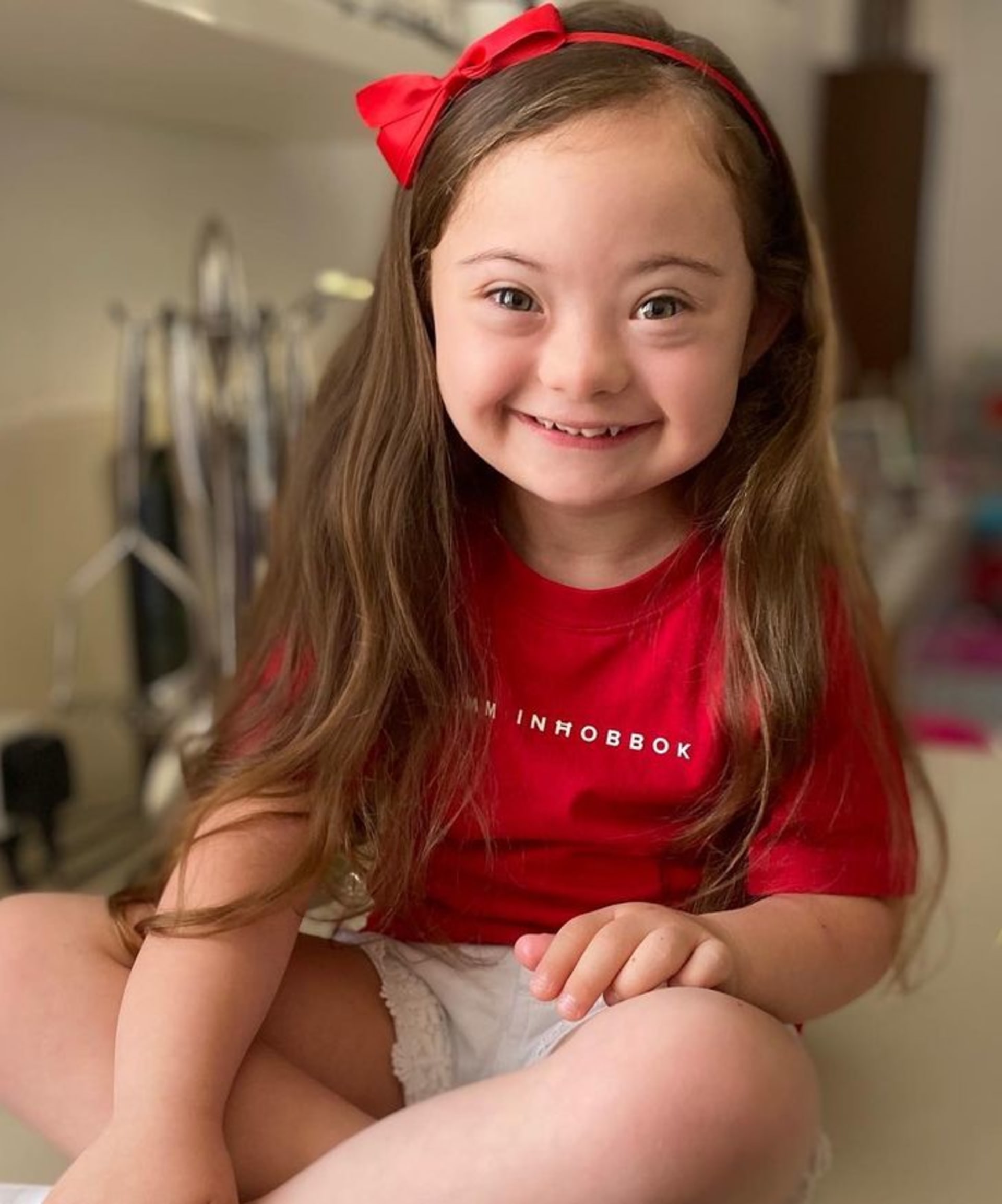 4letá dívka s Downovým syndromem pózuje jako modelka 7