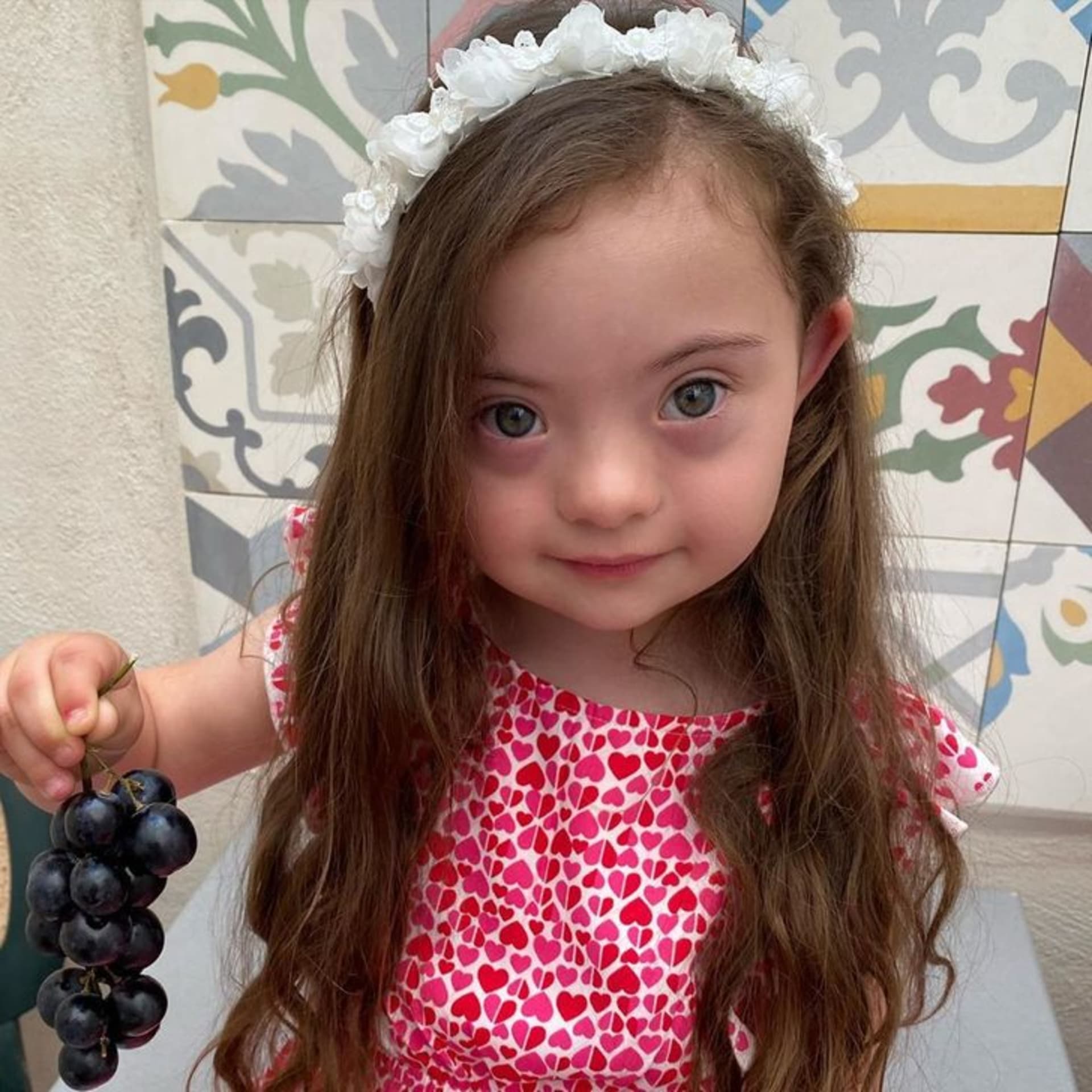 4letá dívka s Downovým syndromem pózuje jako modelka 10
