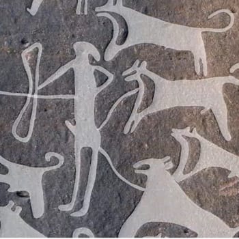První obraz psů na vodítku. Rytiny jsou pravděpodobně staré více než osm tisíc let. 