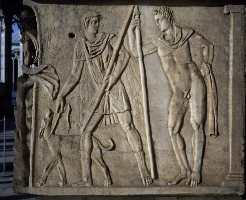 Pastevec se psem na vodítku, scéna z mýtu o Hyppolytovi a Phaedře – reliéf na římském sarkofágu z Pisy, zhruba 180 našeho letopočtu