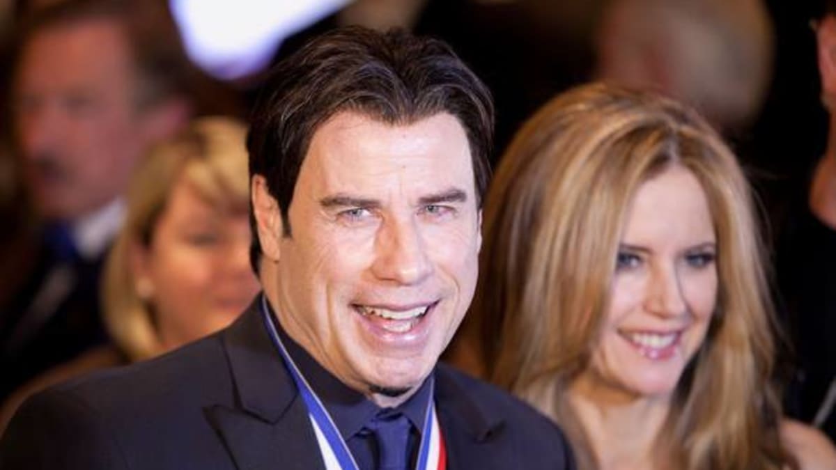 John Travolta s manželkou Kelly