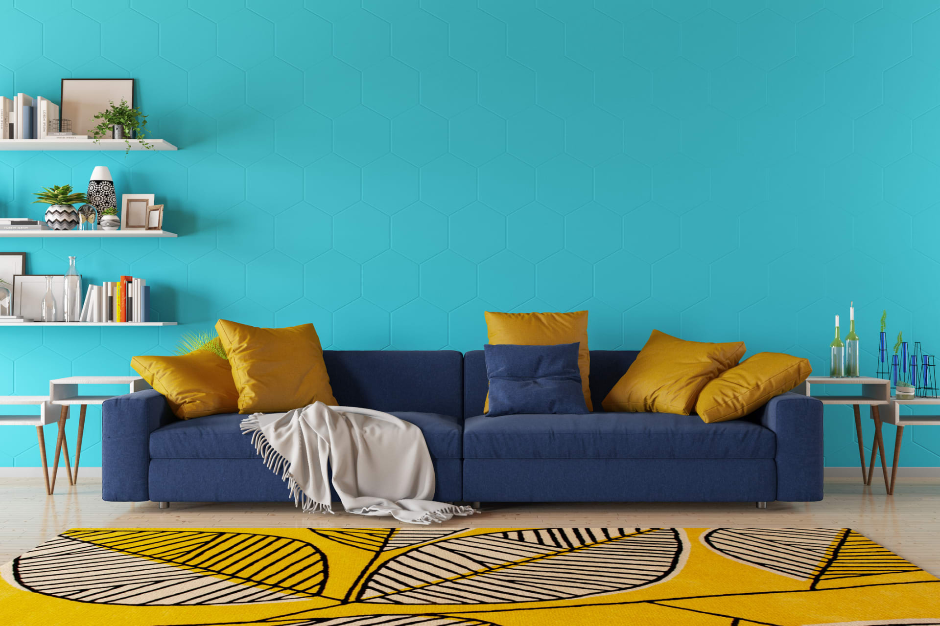 Na stěně chladný tyrkys, na pohovce temně modrý odstín a doplňky ve slunečné žluté. Ideální kombinace