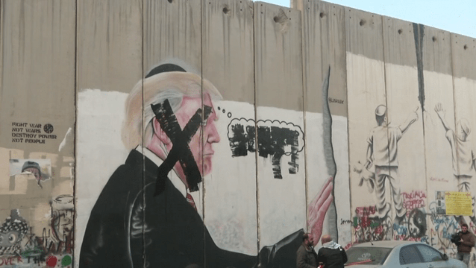 Americký prezident vyobrazený na zdi ve městě Betlém