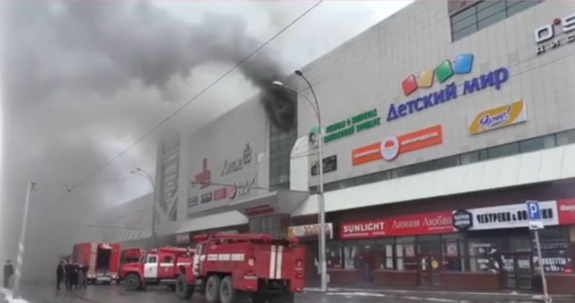 Požár v nákupním centru na Sibiři