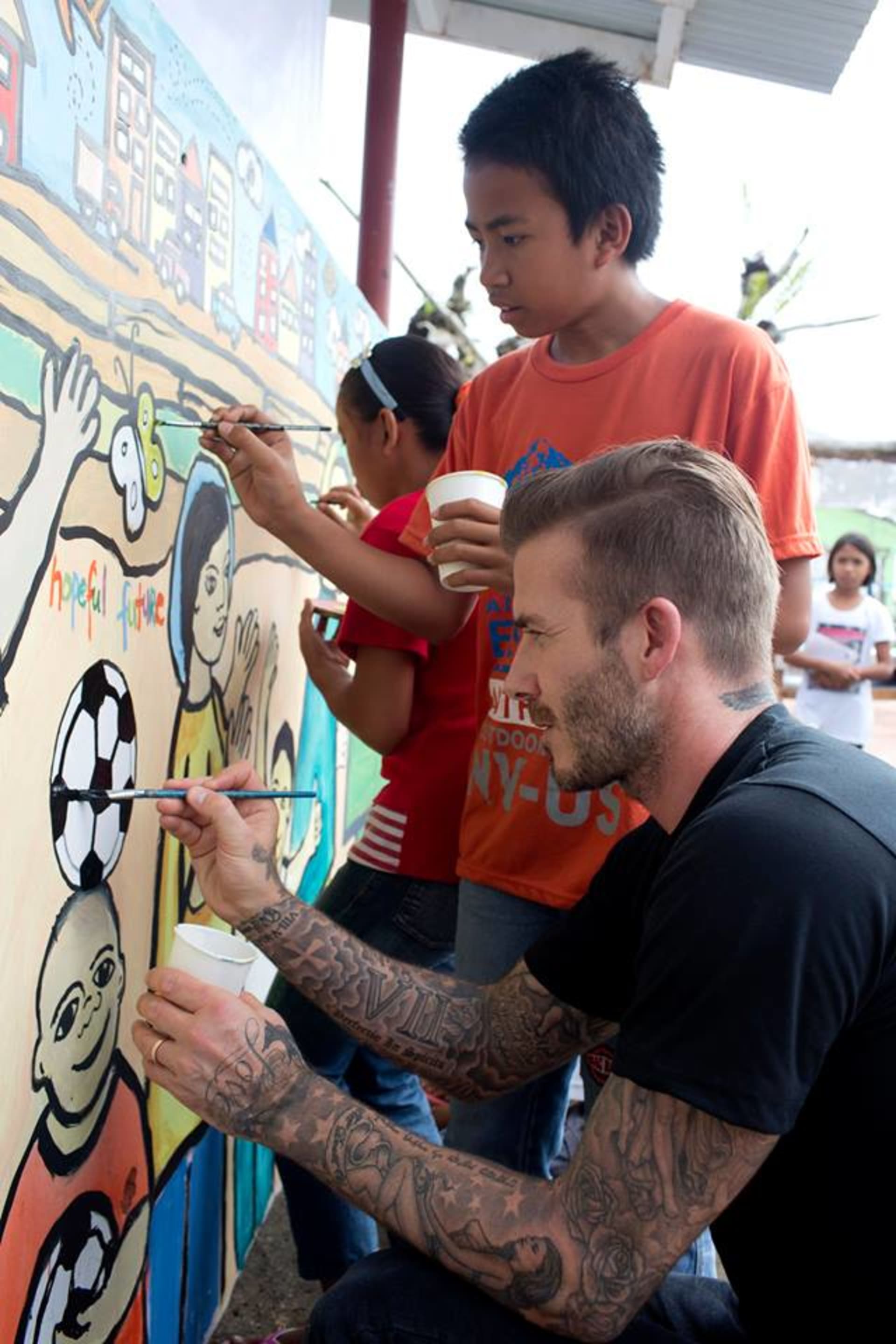 David Beckham pomáhá dětem