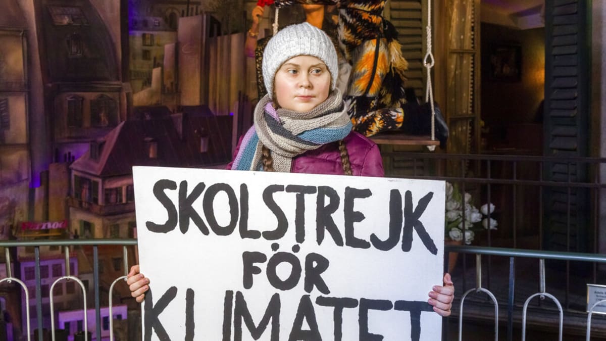 Greta Thunbergová s transparentem