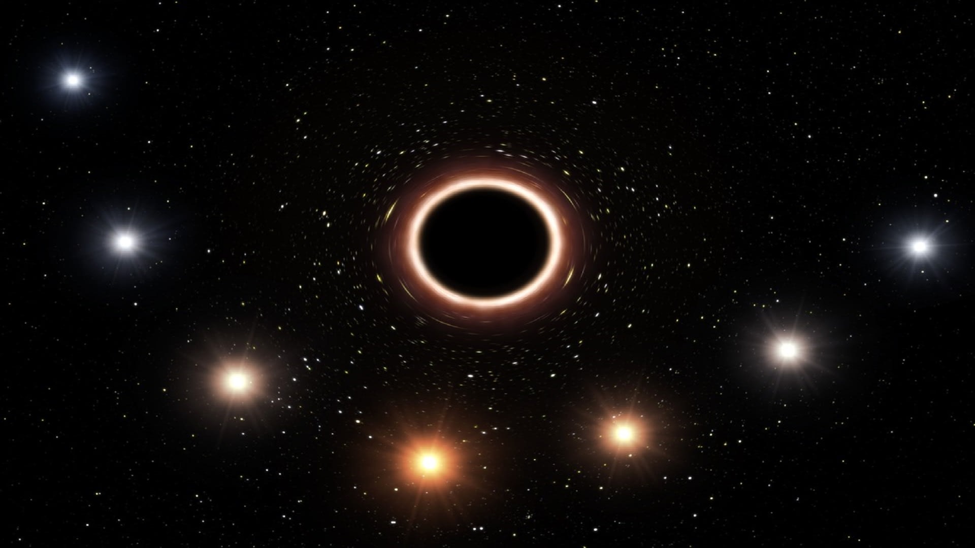 Hvězda procházející kolem supermasivní černé díry postupně mění svou barvu více do červena. Tento jev předpovídal už Albert Einstein