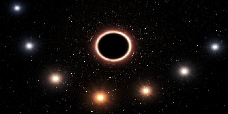 Hvězda procházející kolem supermasivní černé díry postupně mění svou barvu více do červena. Tento jev předpovídal už Albert Einstein